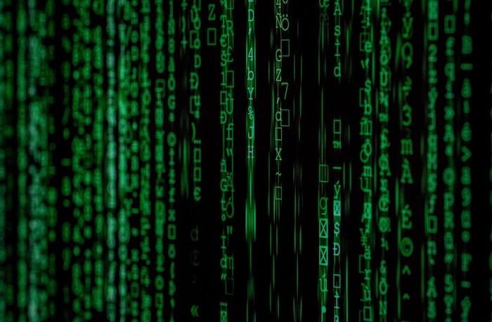 Green code on computer screen